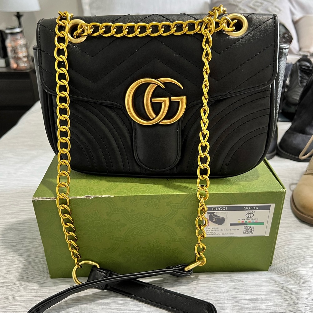 Black and gold chain purse